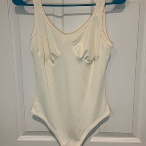 Cream Brown and Black Ribbed bodysuits